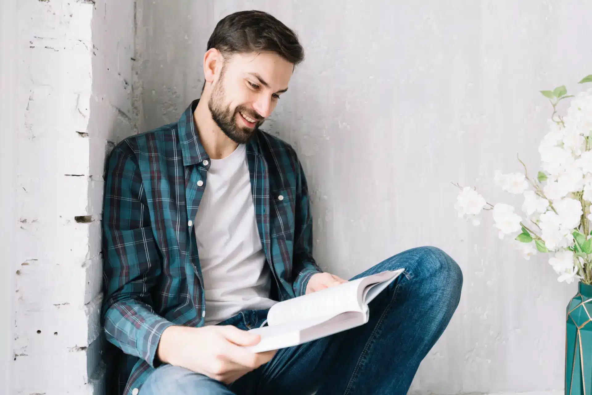 cheerful-man-reading-book